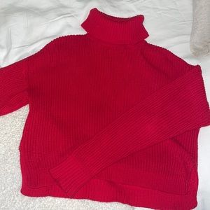 Cropped red turtleneck sweater